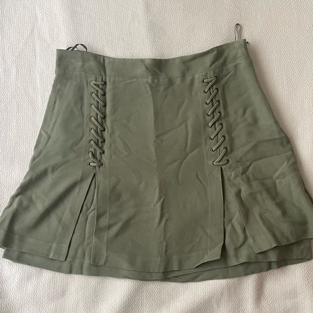 Green skirt with front details